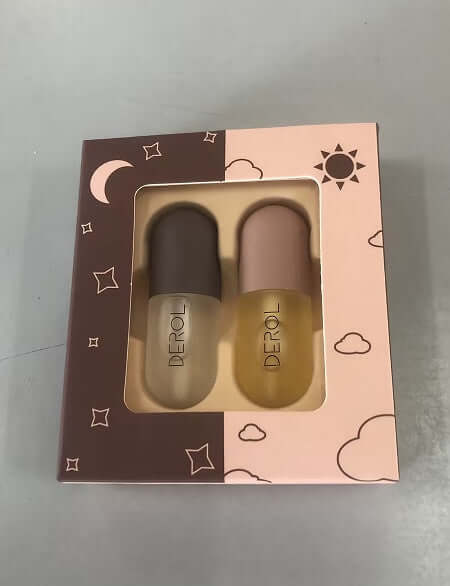 huile repulpante lèvres volume instantané - pack de deux flacons en boîte avec design lune et soleil